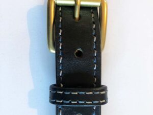 Black belt, brass buckle, blue and white hand-stitching