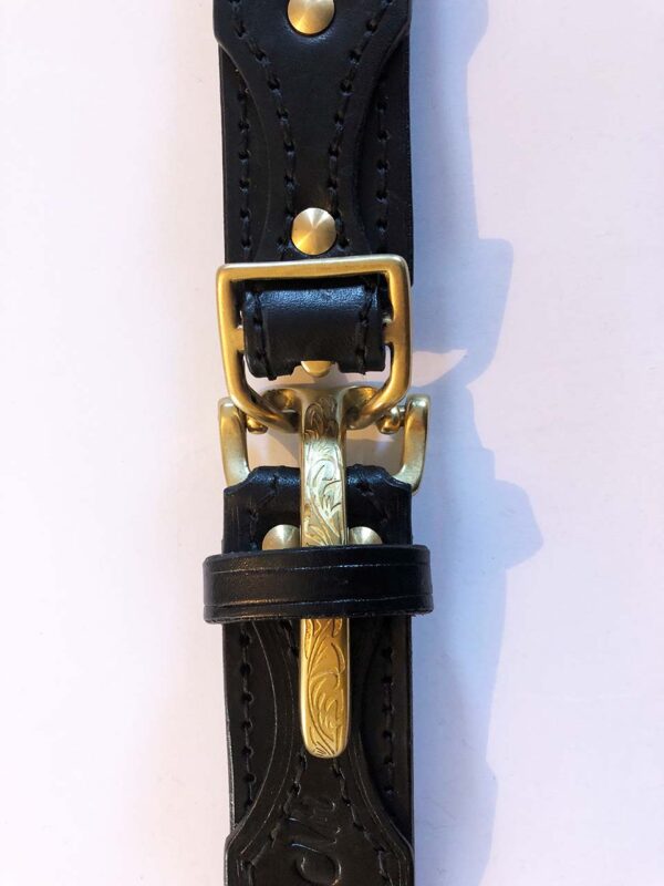 Black leather belt, ornate brass buckle